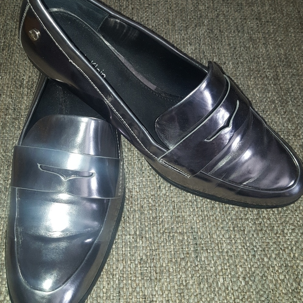 Gently worn Calvin Klein Silver Loafers 8.5